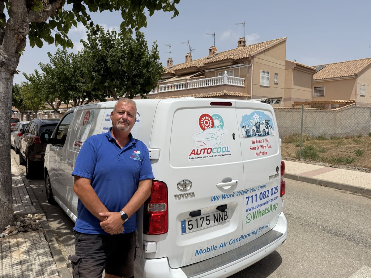 Nico from Autocool Aircon beside the mobile air con service van